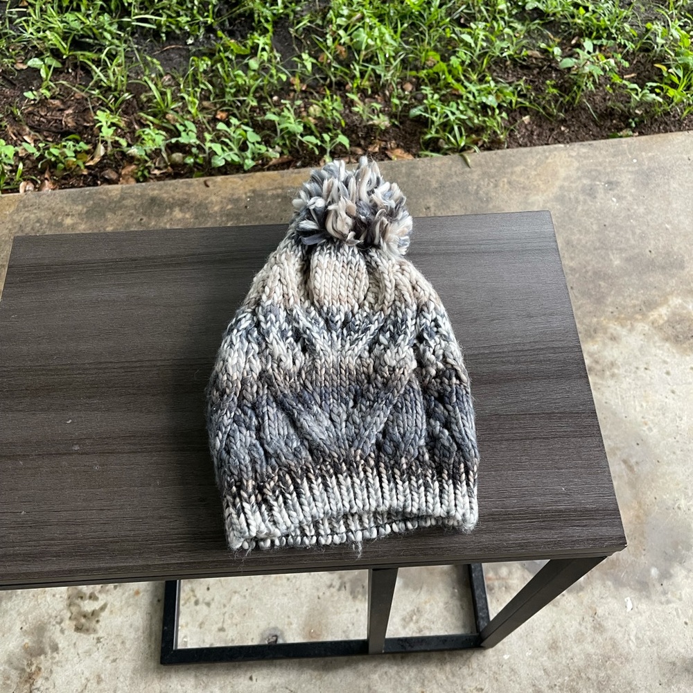 Blue and grey knitted hat.